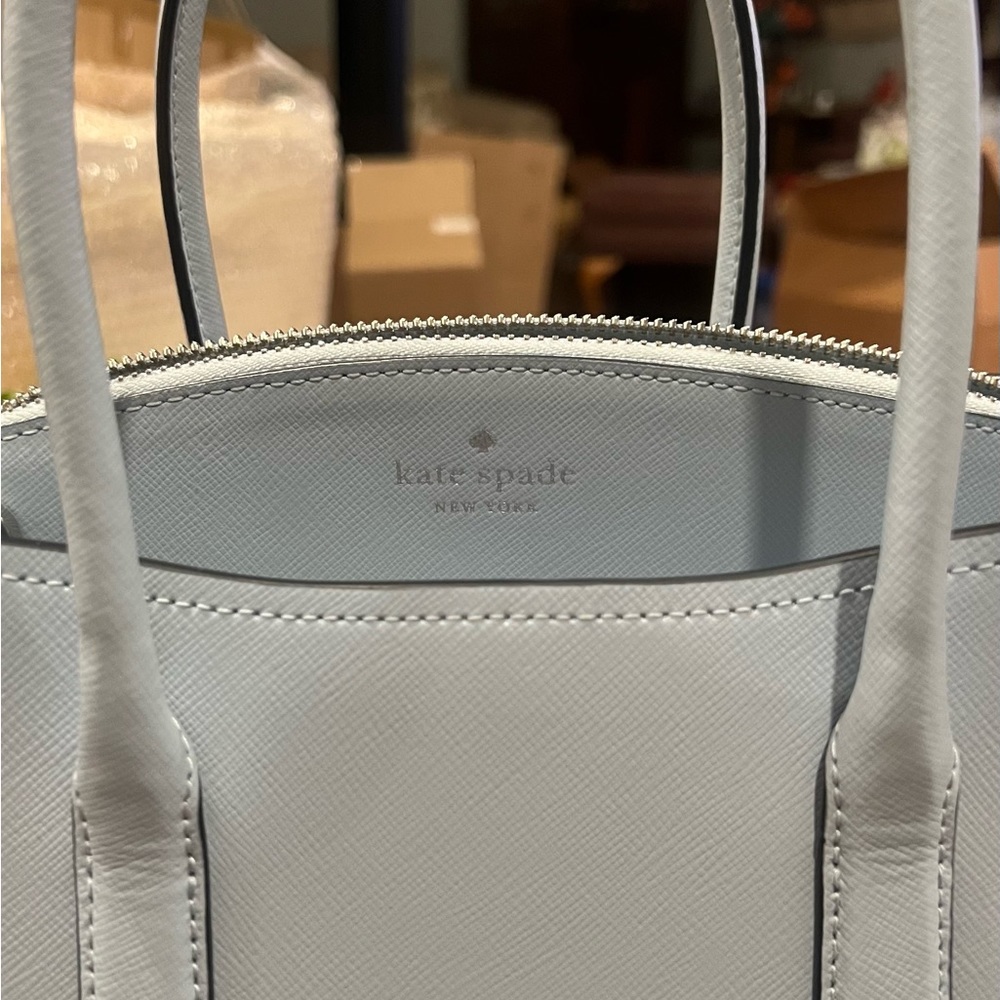 Kate Spade, New York medium Saffiono leather satchel divided into 3 sections
